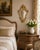 A lovely petite vintage Italian Florentine Rococo style giltwood wall mirror, circa 1950. This stunning mirror displays...