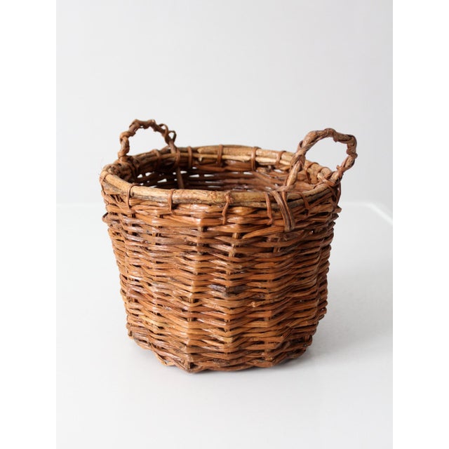 Wood Vintage Handwoven Wicker Basket With Twisted Handles For Sale - Image 7 of 11