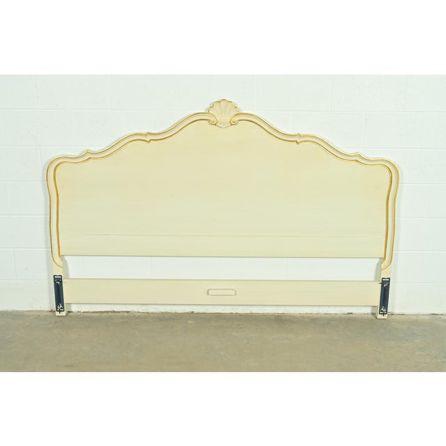 A gorgeous French Provincial Louis XV style king size headboard By Kindel Furniture USA, Circa 1960s Carved solid cherry...