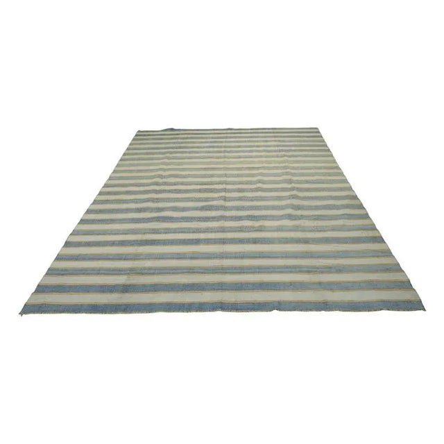 This 8x9 vintage Dhurrie rug is an exciting new curation from Rug & Kilim’s latest acquisition of rare and exemplary mid-...