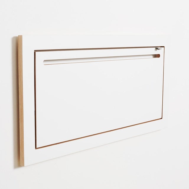 The fläpps hanger rail at first glance, it looks like a standard fläpps shelf, but a closer look reveals a sturdy coat...