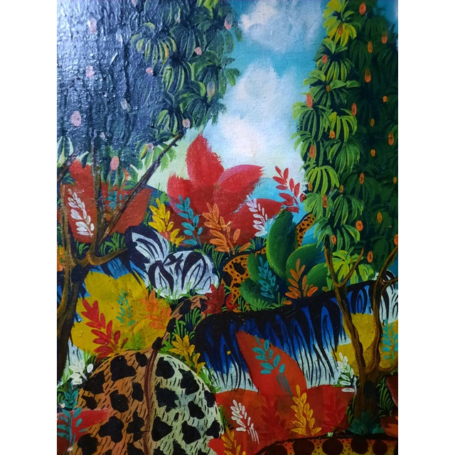 Add vibrant color and exotic charm to your interior with this captivating vintage folk art painting by listed artist Smith...