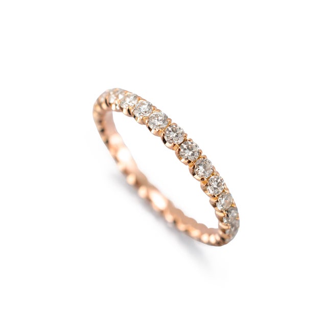 Gender: Ladies Metal Type: 18K Rose Gold Ring Size: 6.5 Width: 2.15 mm Weight: 1.85 grams Ladies 18K rose gold, diamond...