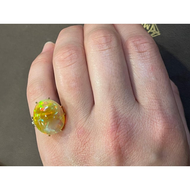 12 Carat Oval Shape Ethiopian Opal Cocktail Ring 14 Karat Yellow Gold For Sale - Image 11 of 18