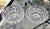 A striking, matched pair of vintage heavy cut crystal catchalls. Featuring a classic, deeply cut Bohemian pinwheel and...