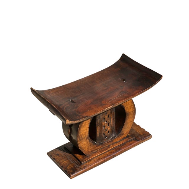 Vintage hand-carved Ashanti stool, Ghana. Crafted from a single piece of indigenous wood, the Ashanti stool is highly...