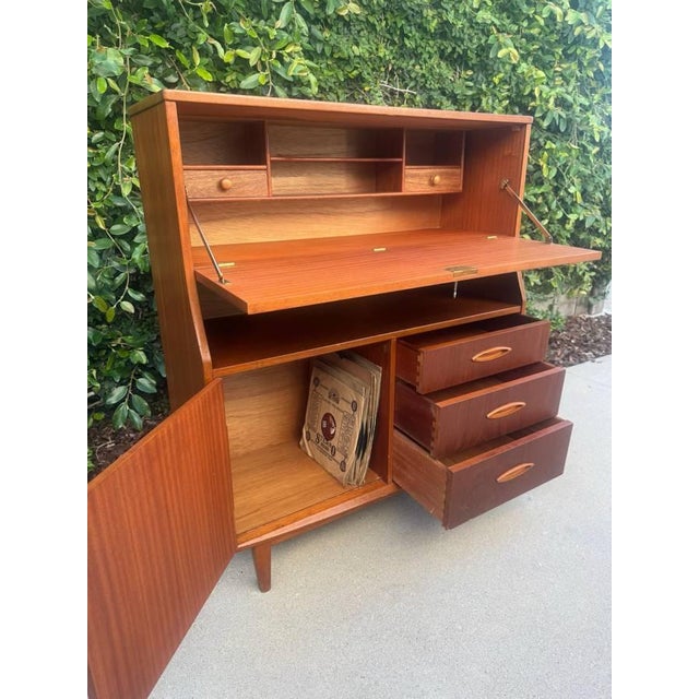 Item #ABX29 Mid Century Modern teak secretary desk by Jentique, made in the 1960s and inspired by classic Danish design....