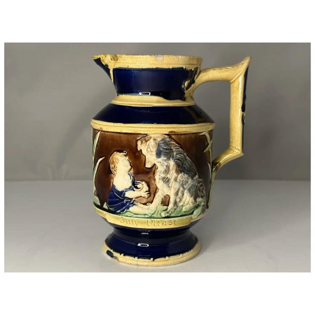 Thomas Forester Majolica "Say Please" Child with Dog Pitcher for your consideration. The pitcher measures approx. 8 inches...