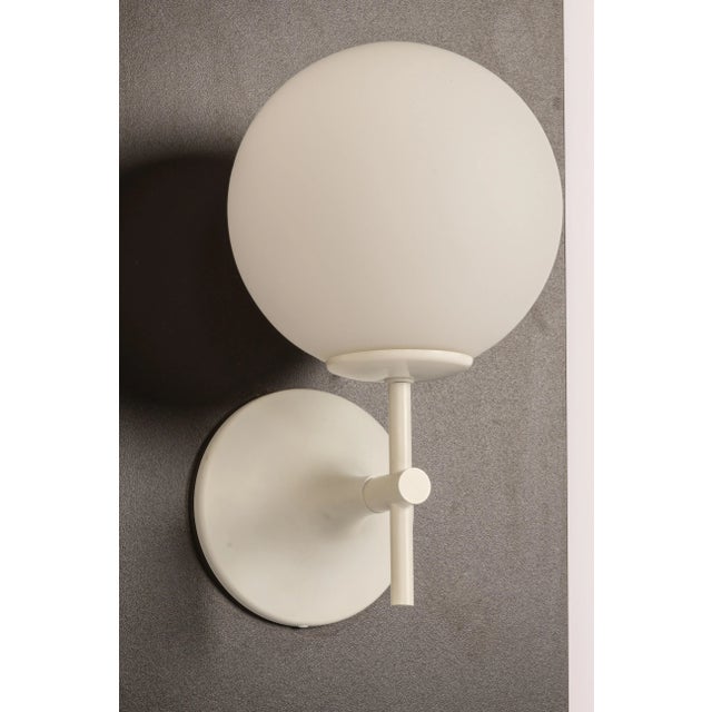 Nice pair of mid-century wall sconces with opal glass piece, designed by eva nele and made by temde, switzerland,...