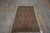 Antique Malayer Small Scatter Size Brown Rug, Circa Date: 1920s. This exquisite example of Persian weaving showcases the...
