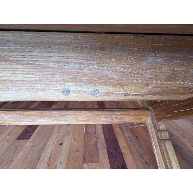 An impressive vintage Ranch Oak dining table by A. Brandt Company of Fort Worth, Texas, retaining its original branded...