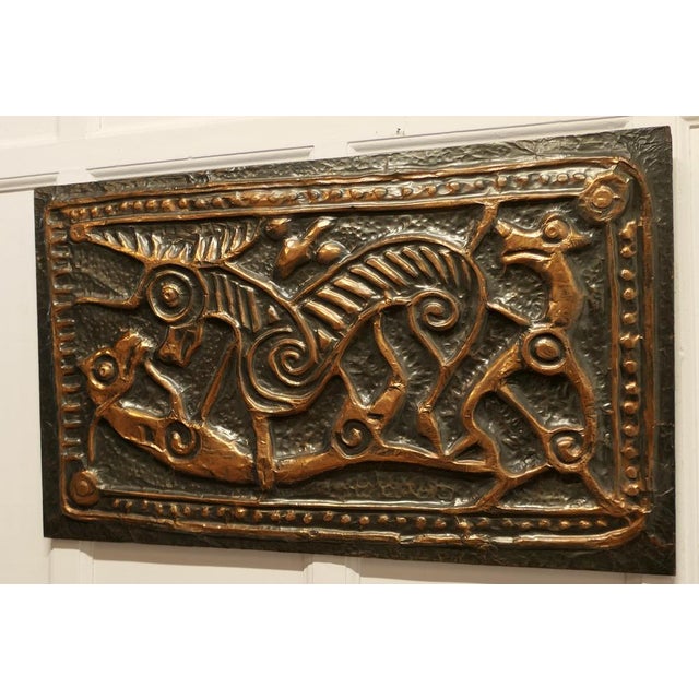 Celtic Art Copper Mural from Ireland, Celtic Animals A hand made beaten copper abstract design of dogs and a stag hunting...
