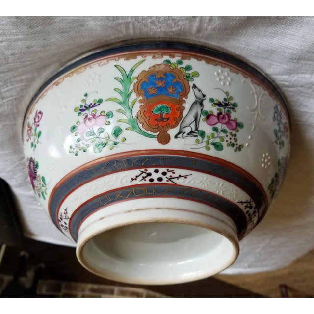 Antique sterling silver rimmed French Samson punch bowl with amorial shield with dogs, raised floral and other decorative...