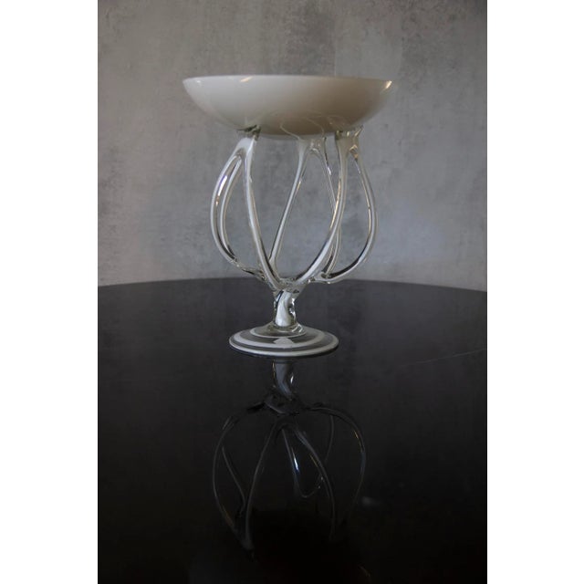 This is very heavy fabulous piece of Fabulously flowing free form design. The ribbons of glass wrap around like an octopus...