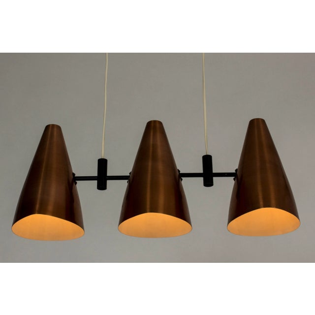 Mid-Century Copper Ceiling Lamp by Eje Ahlgren, in Very Good conditions. Designed 1950 to 1959 This piece is attributed to...