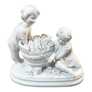 Parian Porcelain Sculpture of Children Making Wine For Sale