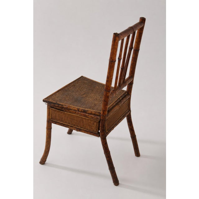 20th Century Victorian English Bamboo and Rattan Wardrobe with Chair, 1920, Set of 2, in Good conditions. Designed 1920 to...