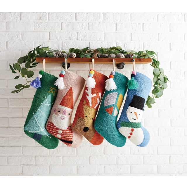 100% wool hooked stocking with cotton/velvet blend backing. A festive way to spruce up your home for the holidays or would...