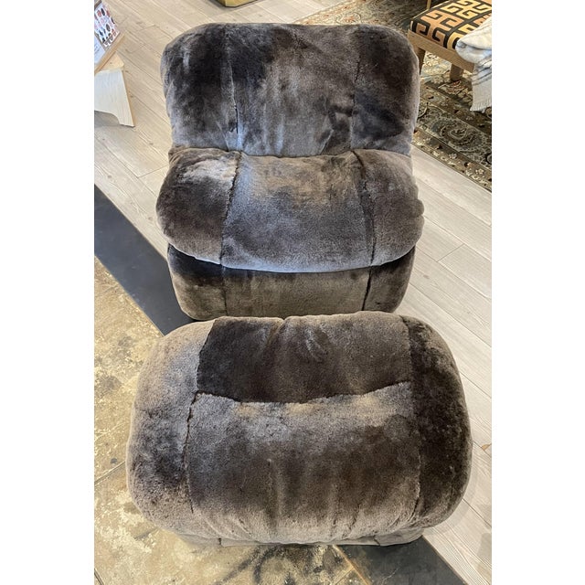 This one-of-a-kind stunning Vintage Lounge Chair with Ottoman is a remarkable set of furniture that boasts sumptuous...