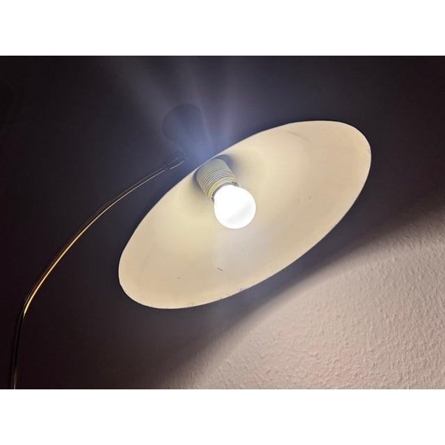 60s desk lamp, with black aluminum lampshade, brass lamp neck & old white metal lamp base. The lamp has been newly...