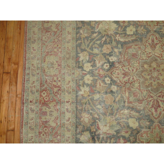 Subtle earth-toned mid-century room size Turkish rug. Measures: 6'7'' x 11'1''.