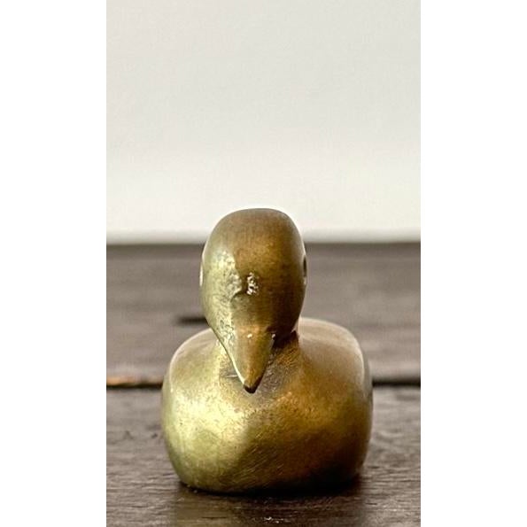 This charming brass dove paperweight is a wonderful blend of elegance and functionality, perfect for bringing a touch of...