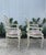 Pair of vintage Hollywood regency-style arm chairs with cane backs. Frames have a carved design to resemble twisted rope...