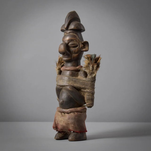 The Yaka Miniature Figure hails from the Congo, representing the spiritual beliefs and cultural practices of the Yaka...