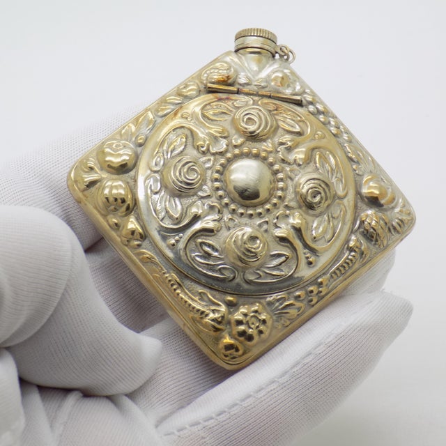 A charming vintage Italian pill snuff trinket box paired with a perfume bottle, handcrafted in genuine silver during the...