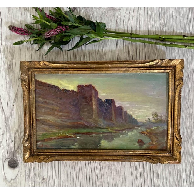 Acquired in France, a lovely small antique landscape oil painting by French artist, Camille Ravot (1873-1945). Ravot was a...