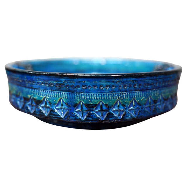 A vintage Italian Mid-Century Modern handmade ceramic footed cigar ash receiver in the vibrant signature blue of Aldo...