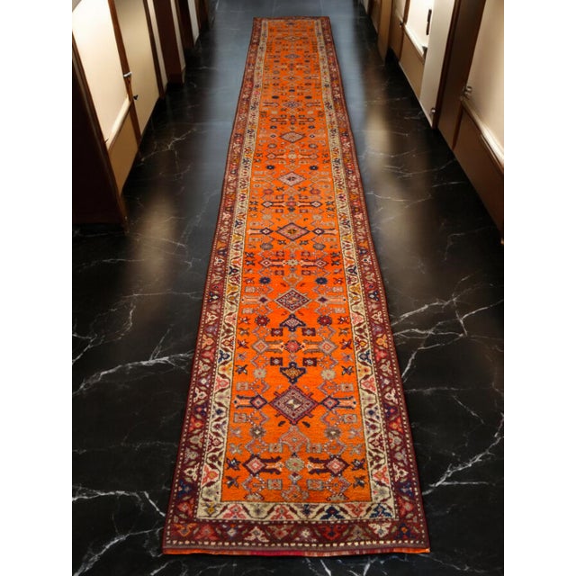 Hailing from the Oushak region of Aegean Anatolia, this remarkable 1960s hand-knotted runner offers an unprecedented scale...