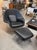 A beautiful black leather Eero Saarinen for Knoll Womb Chair and Ottoman. Both pieces retain their original labels. The...