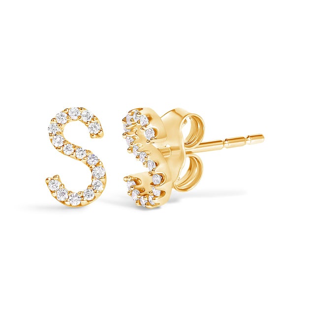 Expertly crafted to symbolize individuality and grace, this exquisite "S" initial stud earring is fashioned from radiant...