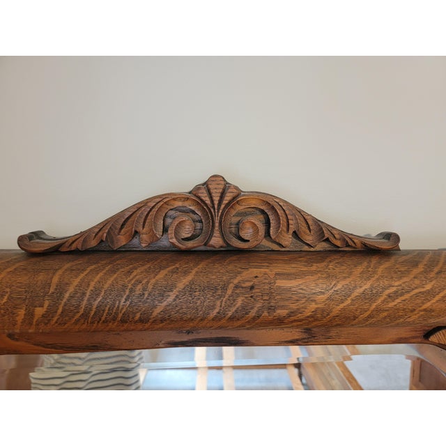 Offered here is one piece from a long-preserved American quarter-sawn tiger oak bedroom suite dating to approximately...