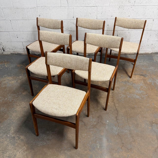 One of the most classic and timeless pieces of Danish design, these Erik Buch teak chairs are perfect for any dining room....