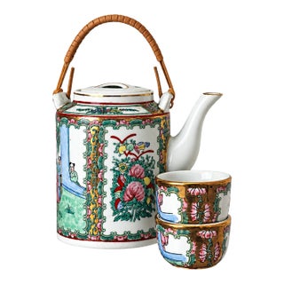 Mid 20th Century Chinese Rose Medallion Porcelain Teapot With Wrapped Cane Handle & Two Cups — 3-Piece Set For Sale