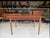 This mid-century dining table is in good used condition with age related signs of use. Stable and sound in construction,...