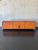 Vintage mid-century decorative box clad in warm cognac-toned leather with handsome bronze accents. Features rows of...