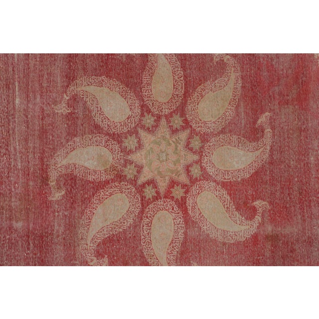 Hand-knotted in wool, this 5x5 vintage Anatolian square rug, circa 1950-1959, showcases a striking radial medallion formed...