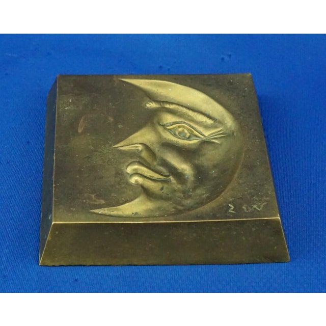 Gilded bronze sculpture with a hollowed-out anthropomorphic crescent moon, signed "zev" by the artist on the lower right,...