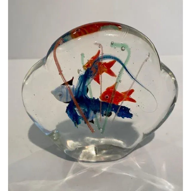 Nice and charming without the need for fish food. Made in the 1990s.