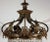 Beautifully wrought bronze and crystal chandelier. Incredible garland and floral detail.