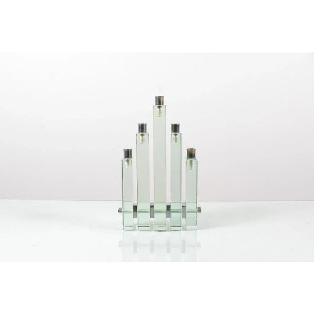 Very stylish five-prism candle holder, with ladder heights, in thick Nile green glass, with compartments for candles and...