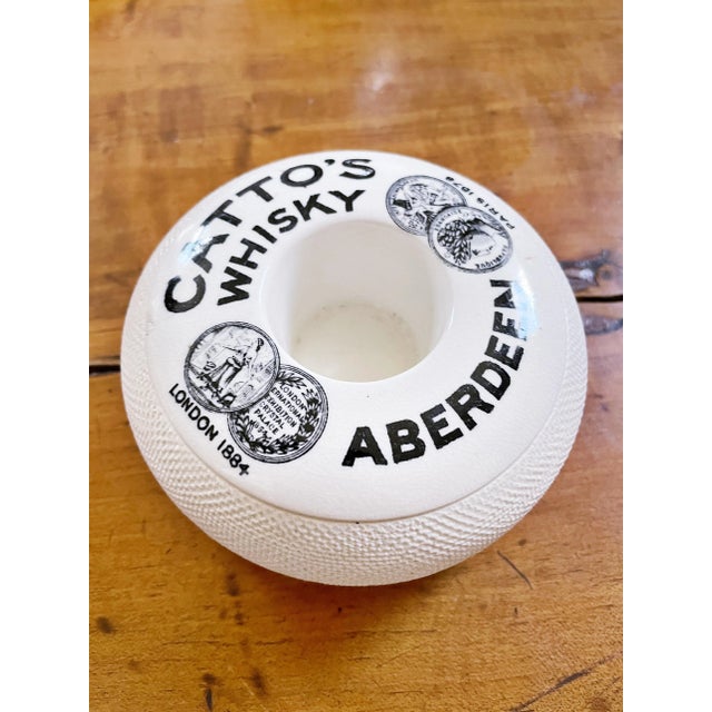 An antique English stoneware match strike, made to be used in a pub to advertise a Scottish whisky. In excellent condition...