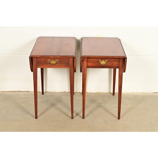 A gorgeous pair of Georgian or Regency style Pembroke nightstands, tea tables, or side tables By Henkel Harris USA, Circa...
