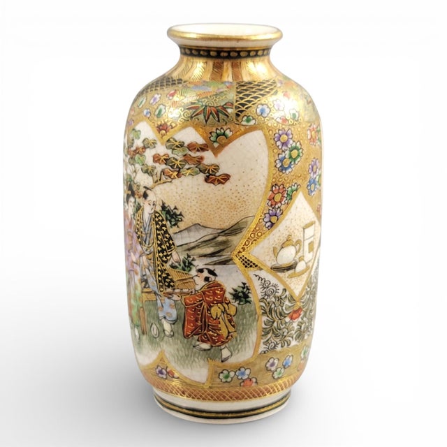 Finely decorated Japanese Satsuma vase from the Meiji era (c.1890–1900), showcasing a family scene with a child and...