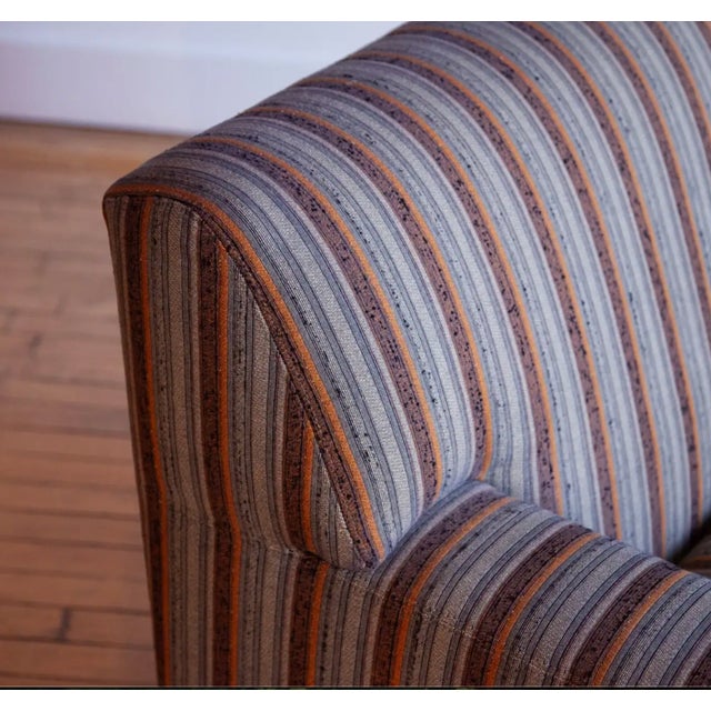 We are thrilled to present this extremely comfortable lounge chair and ottoman by Christian Liaigre for Holly Hunt. Bears...