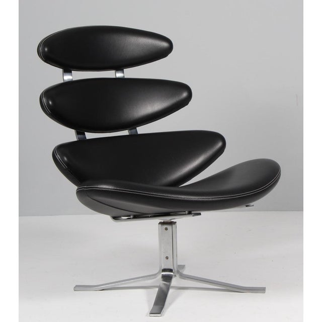 Poul M. Volther lounge chair in original black leather. Frame of brushed steel. Model EJ-5 Corona, made by Erik Jørgensen....