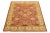This exquisite, handmade wool rug features a red field with a beige and yellow allover design. This rug measures 8'2" x...